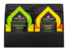 Load image into Gallery viewer, Discovery Box with luxury organic loose leaf teas and collagen peptides. Satin finish black box with 9 pouches of loose leaf tea and 1 pouch of collagen peptides powder. Gift Pack. Loose leaf tea gift pack. Open front view with 2 packs, 10 pouches standing in 2 rows of 5.