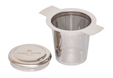 Load image into Gallery viewer, Front view stylish stainless steel loose leaf tea infuser with black silicone detail and lid that doubles as a saucer. In-cup tea infuser.