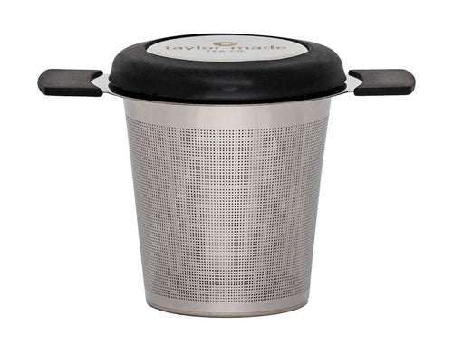 Front view stylish stainless steel loose leaf tea infuser with black silicone detail and lid that doubles as a saucer. In-cup tea infuser. 