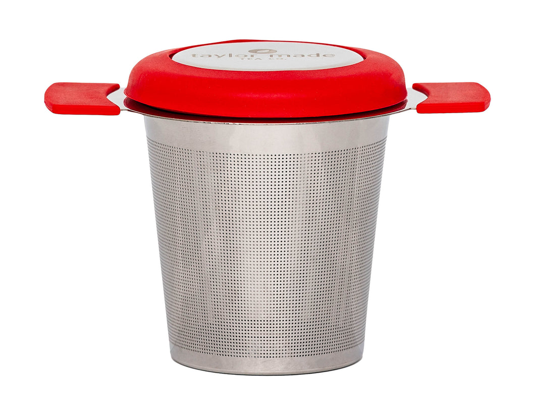 Front view stylish stainless steel loose leaf tea infuser with red silicone detail and lid that doubles as a saucer. In-cup tea infuser. 