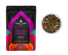 Load image into Gallery viewer, Lilli Pilli Liquorice organic loose leaf digestive tea pouch with glass bowl containing tea leaves with white marshmallow and liquorice root. Purple pouch design. 
