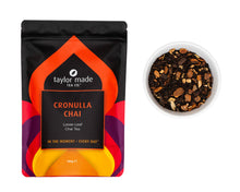 Load image into Gallery viewer, Cronulla Chai organic loose leaf chai tea. Chai spices brown and golden in black tea base contained in a glass bowl next to the tea pouch.
